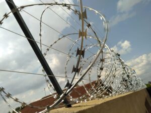 Electric fence and razor wire